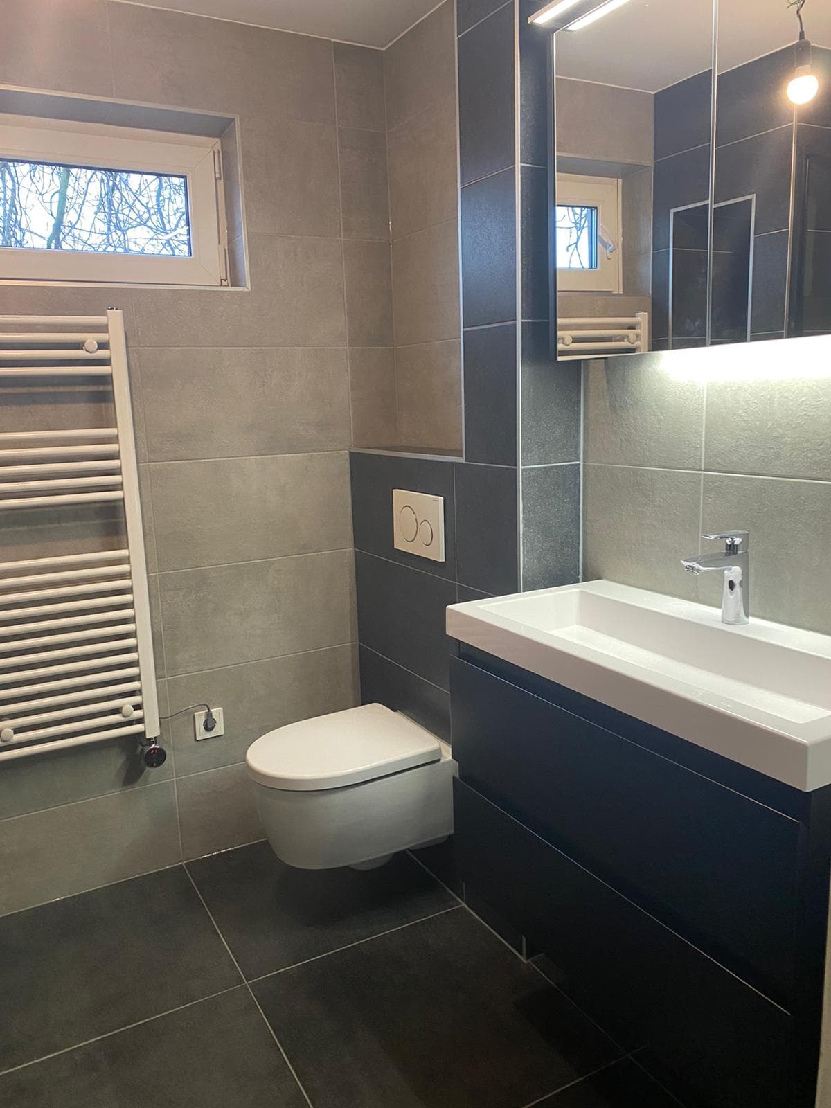Badkamer in antraciet & betonlook